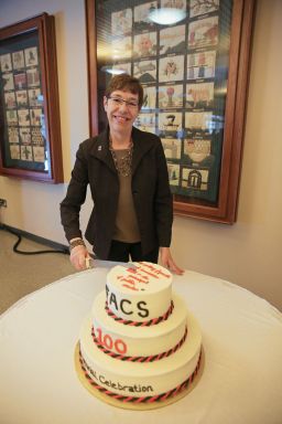 Dean Fox cutting birthday cake