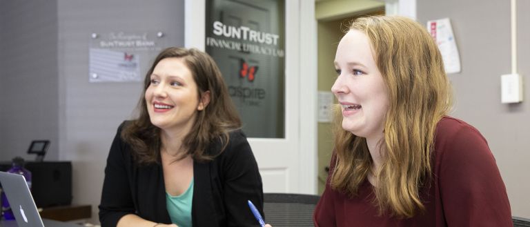  <p>(Top Left) Josh Boe, marriage and family therapy student, provides services under the state-required supervision of licensed marriage and family therapists. (Right) Walsdorf and Carney discuss client strategies.</p>