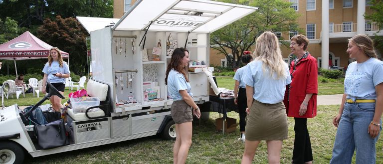 Students in front of cart