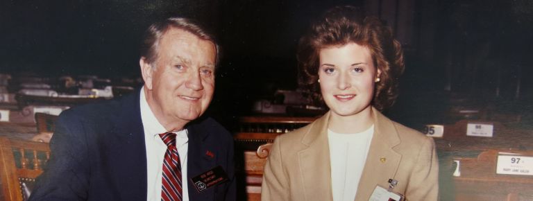 Woman and man in business suits