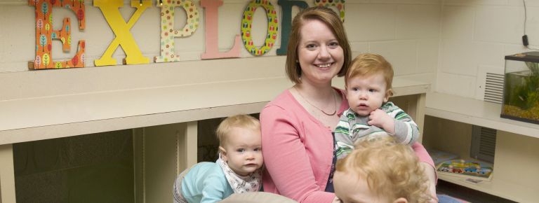 Woman holding children