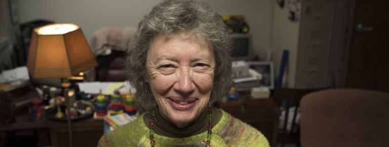 Woman in front of desk