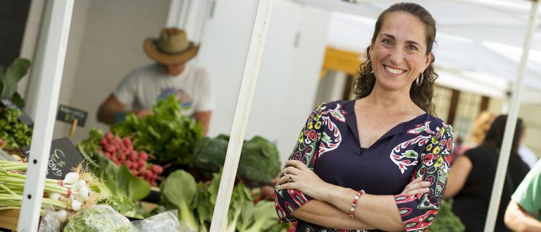 woman in front of foods