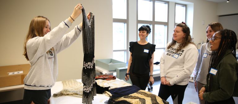 Students reviewing clothes